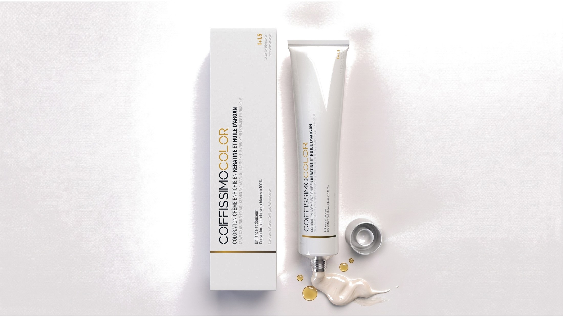 Étui et tube Coiffissimo Color ouvert, crème colorante et gouttes d’huile d’argan, vue de dessus
