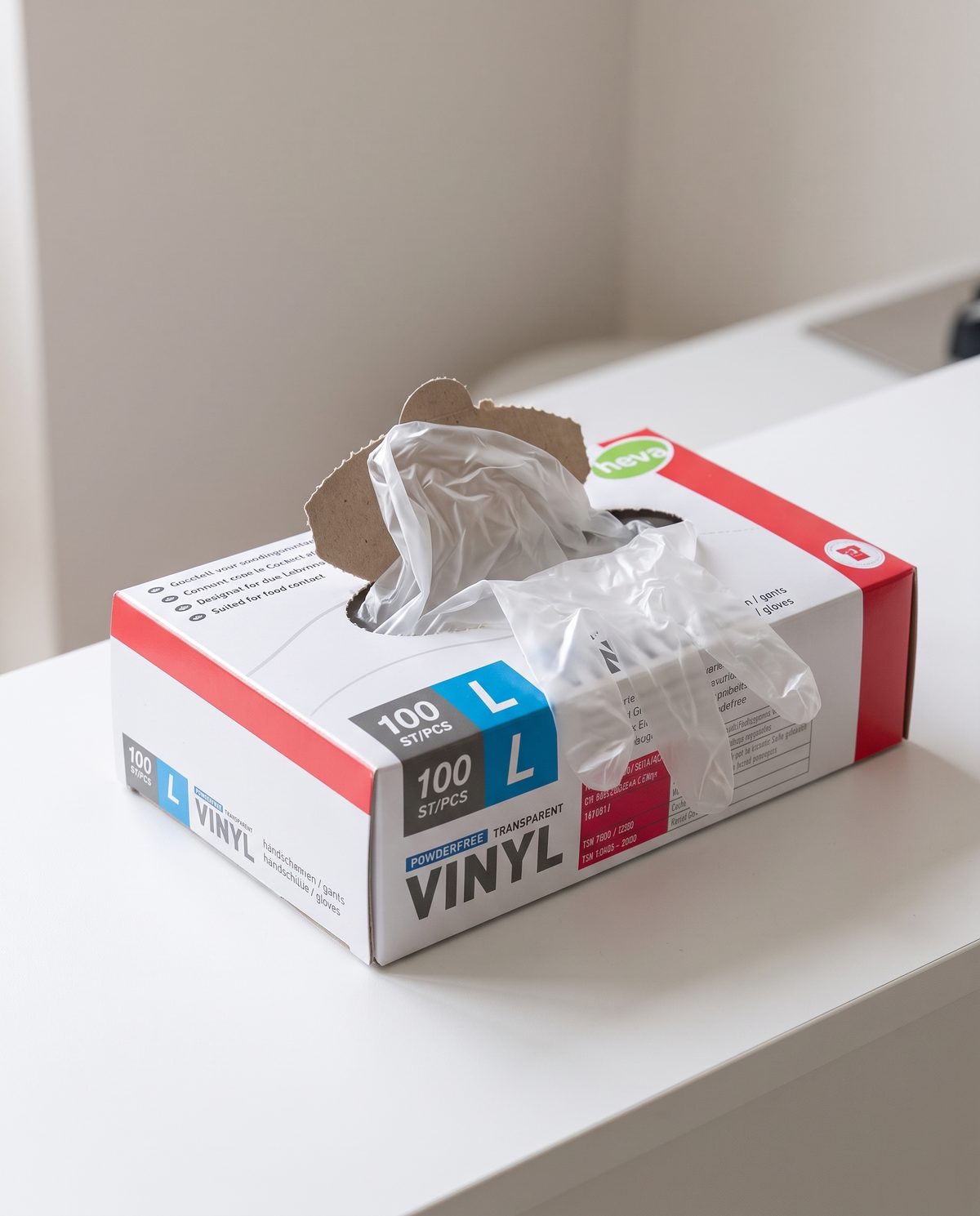 Boîte de 100 gants en vinyle transparent taille L, ouverte